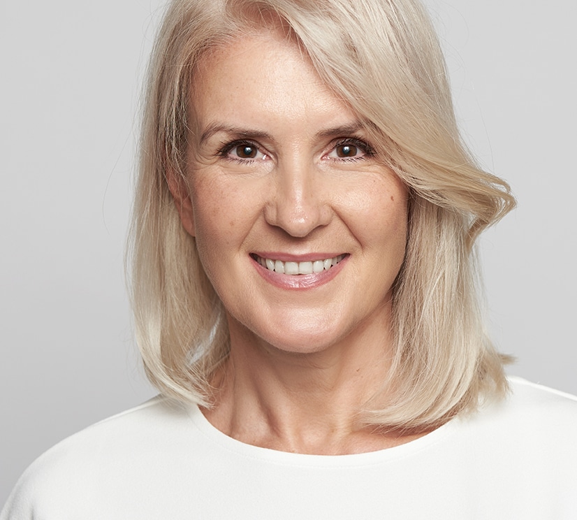 Beautiful 50 years old lady is smiling. Isolated facelift